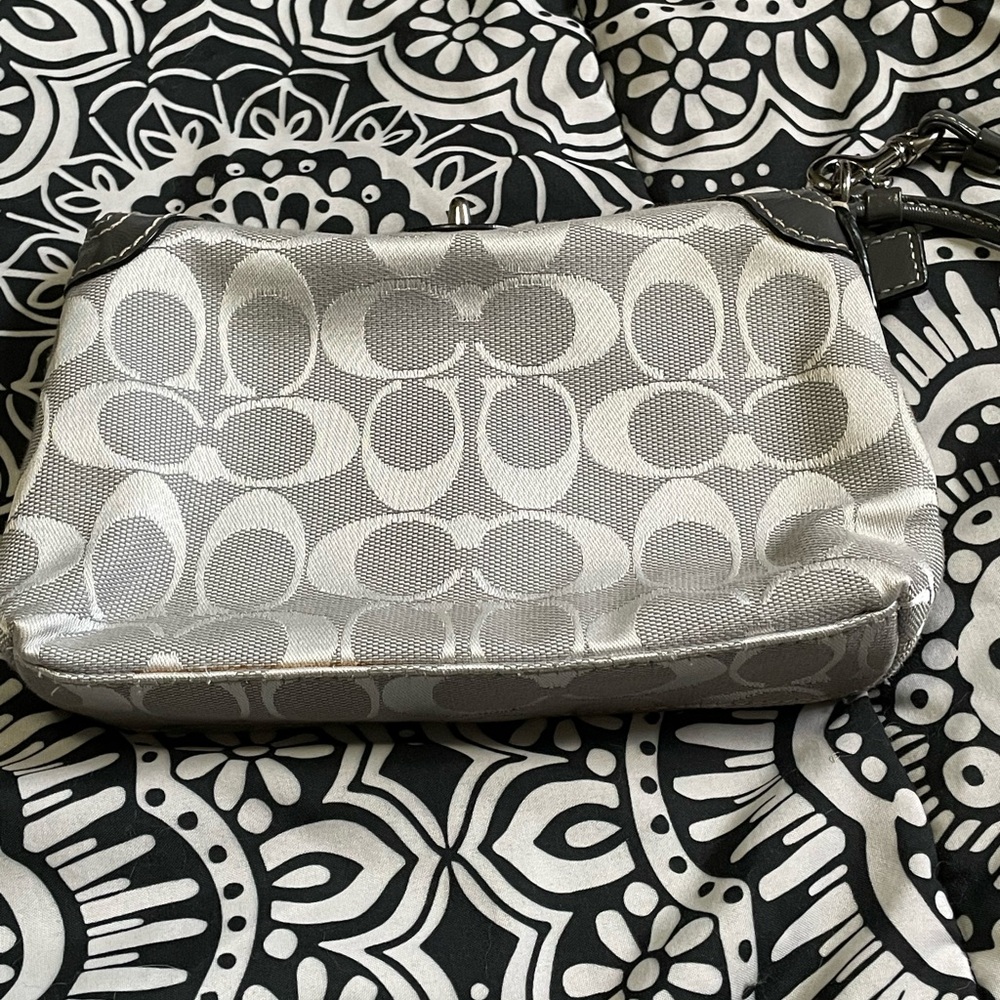 Light Grey/Silver “Signature C” Coach Wristlet